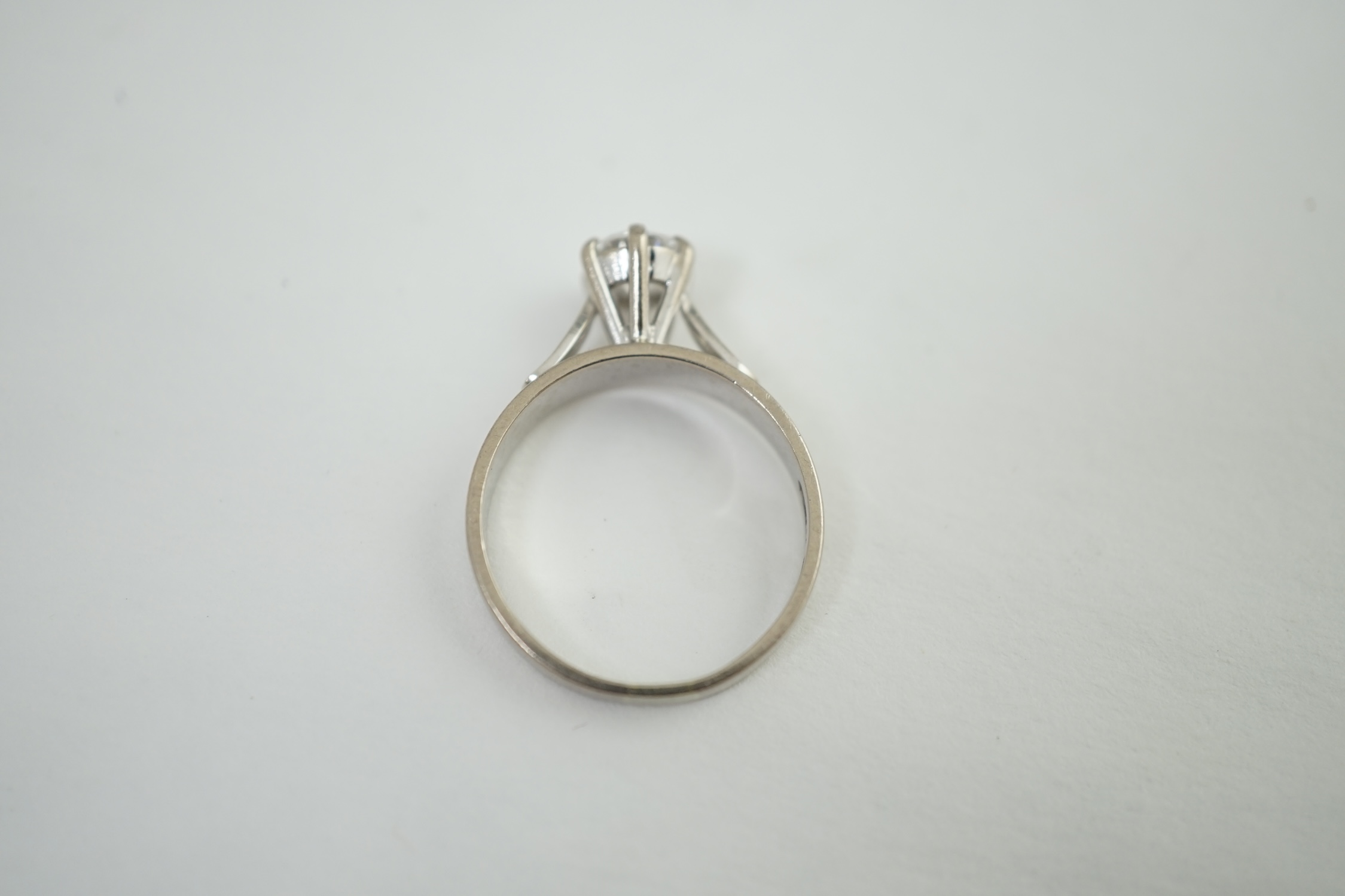 A late 20th century 18ct white gold and solitaire diamond set ring